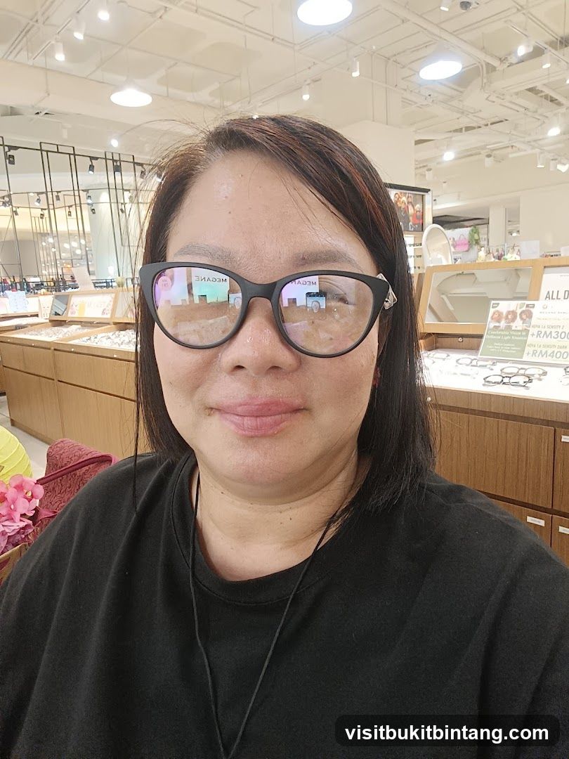Woman wearing glasses in an optical shop