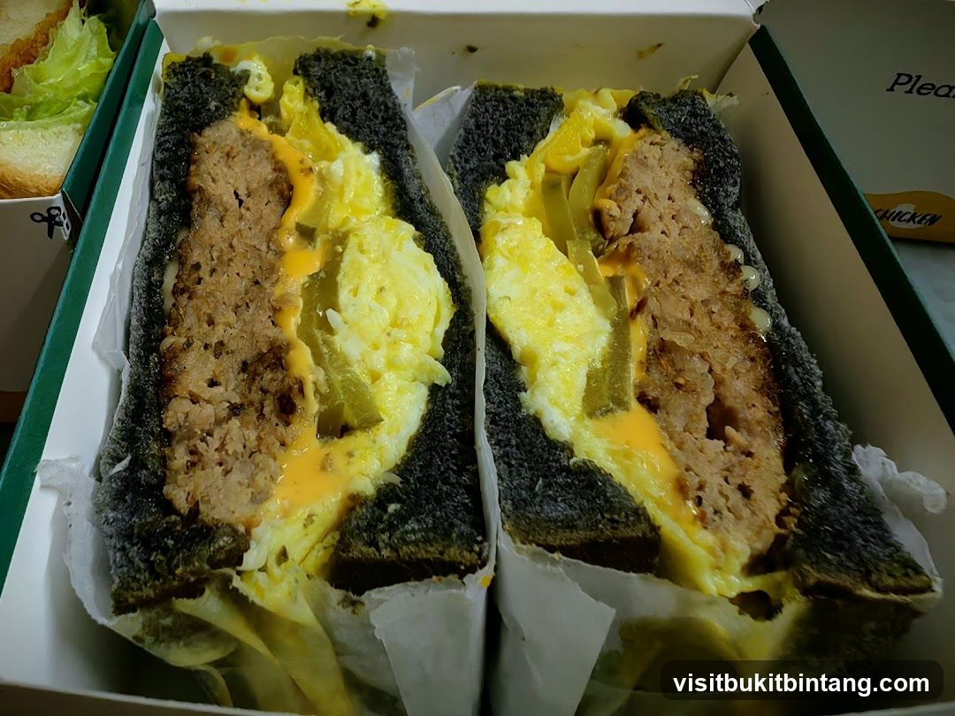 Sandwich with Meat Patty and Scrambled Eggs