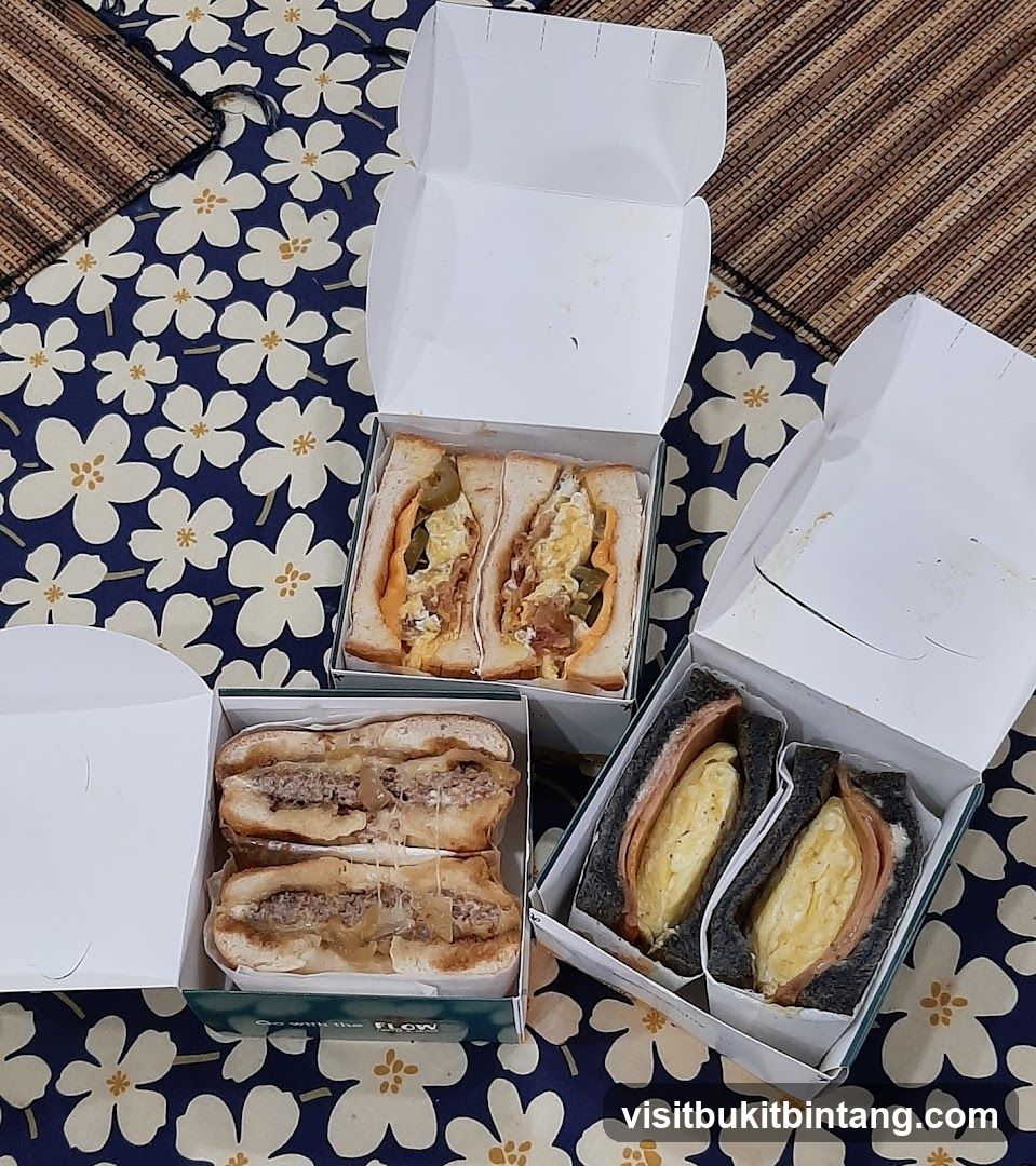 Three Boxes of Sandwiches