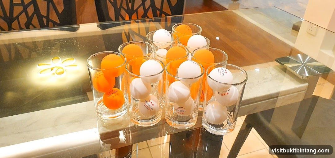 Ping Pong Balls in Glasses