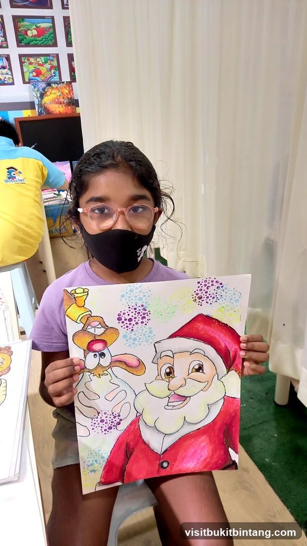 Child Holding Christmas Artwork