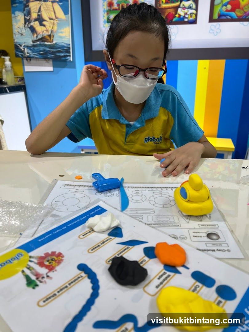 Child doing clay modeling