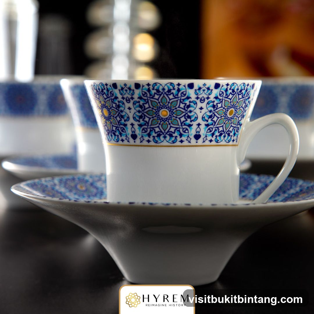 Coffee cups with intricate blue and gold patterns