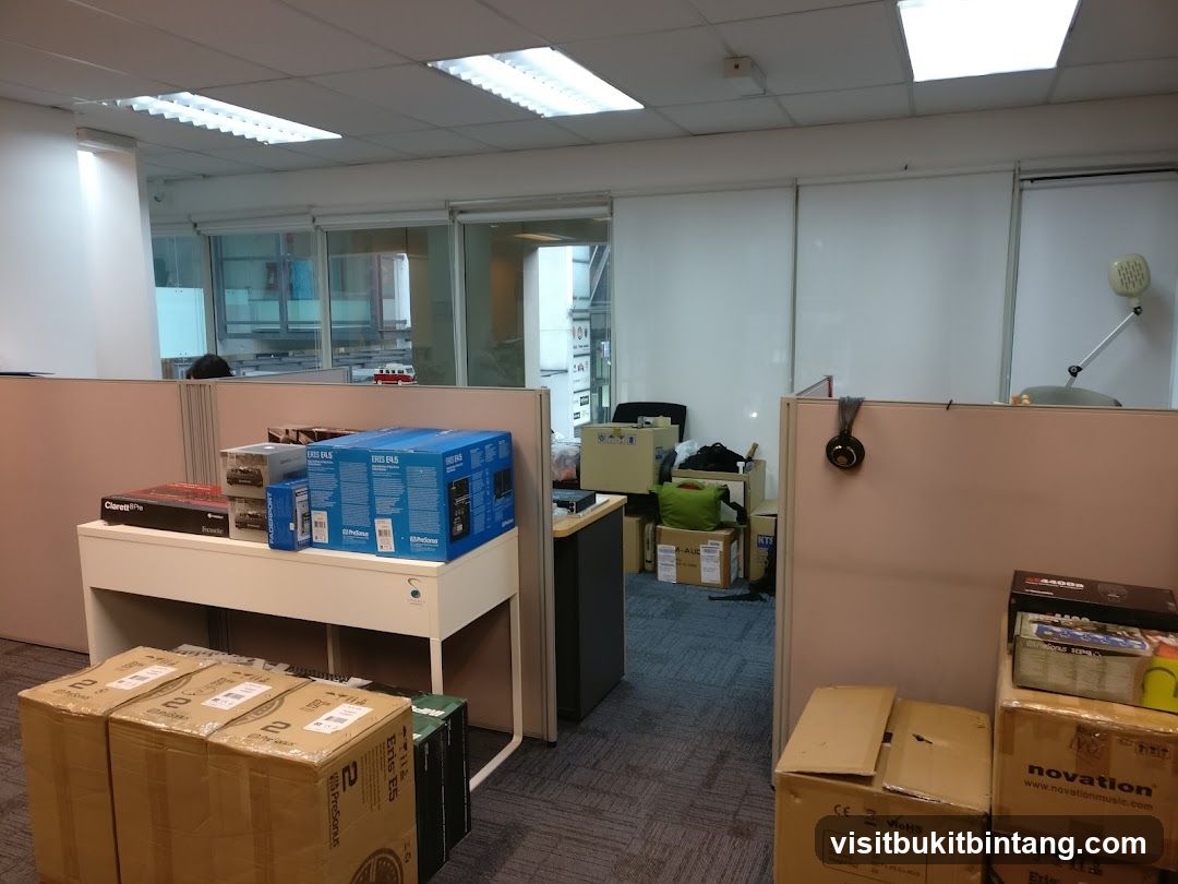 Office Cubicles with Boxes and Equipment