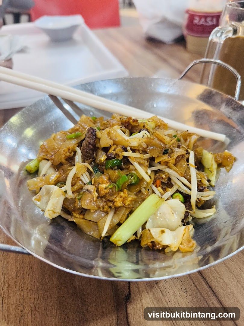 Stir-fried noodles with chopsticks