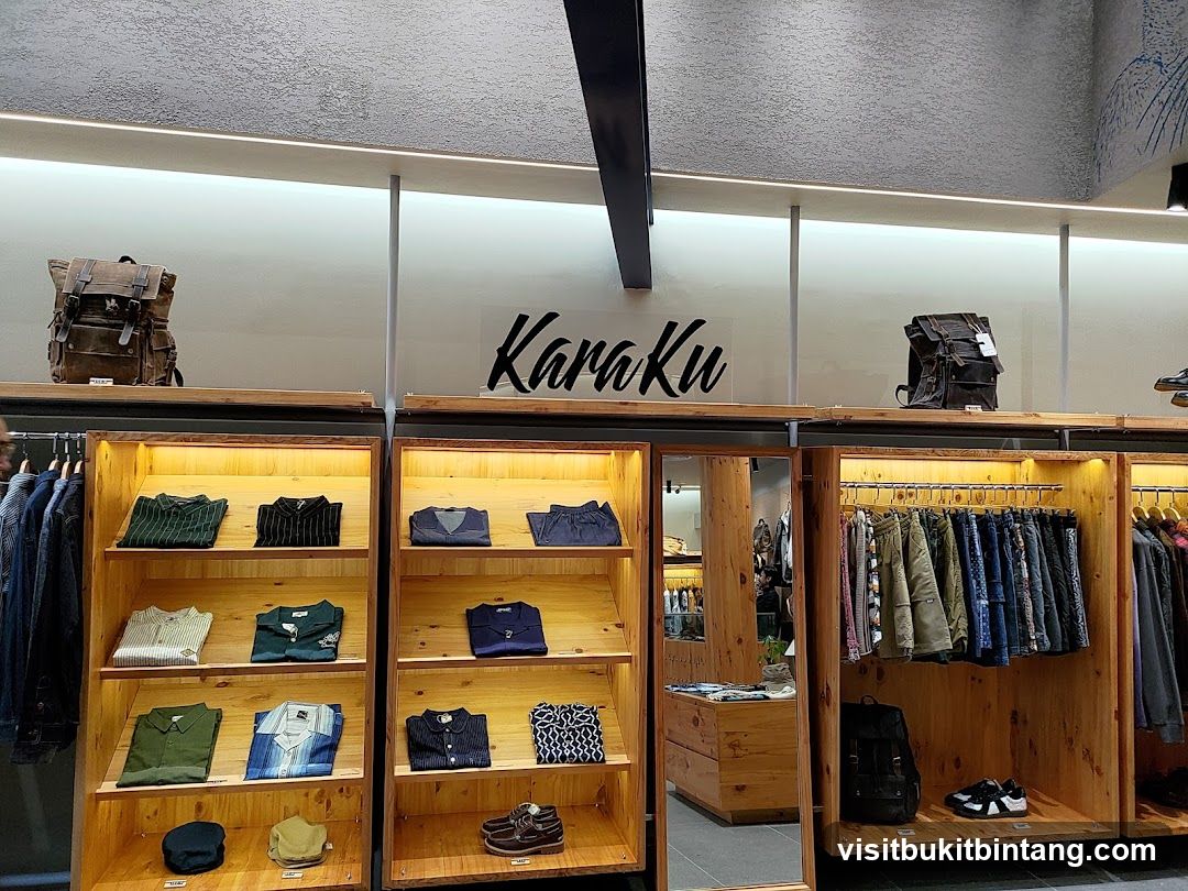 Clothing store interior with display shelves and racks