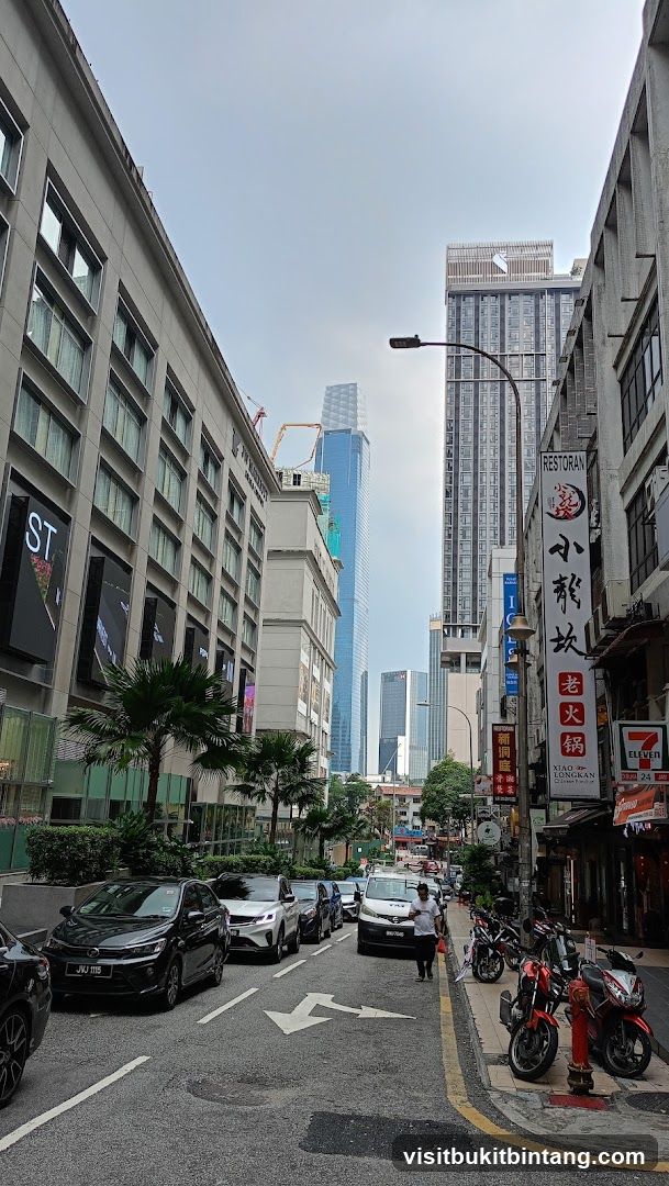 City Street with Tall Buildings and Traffic