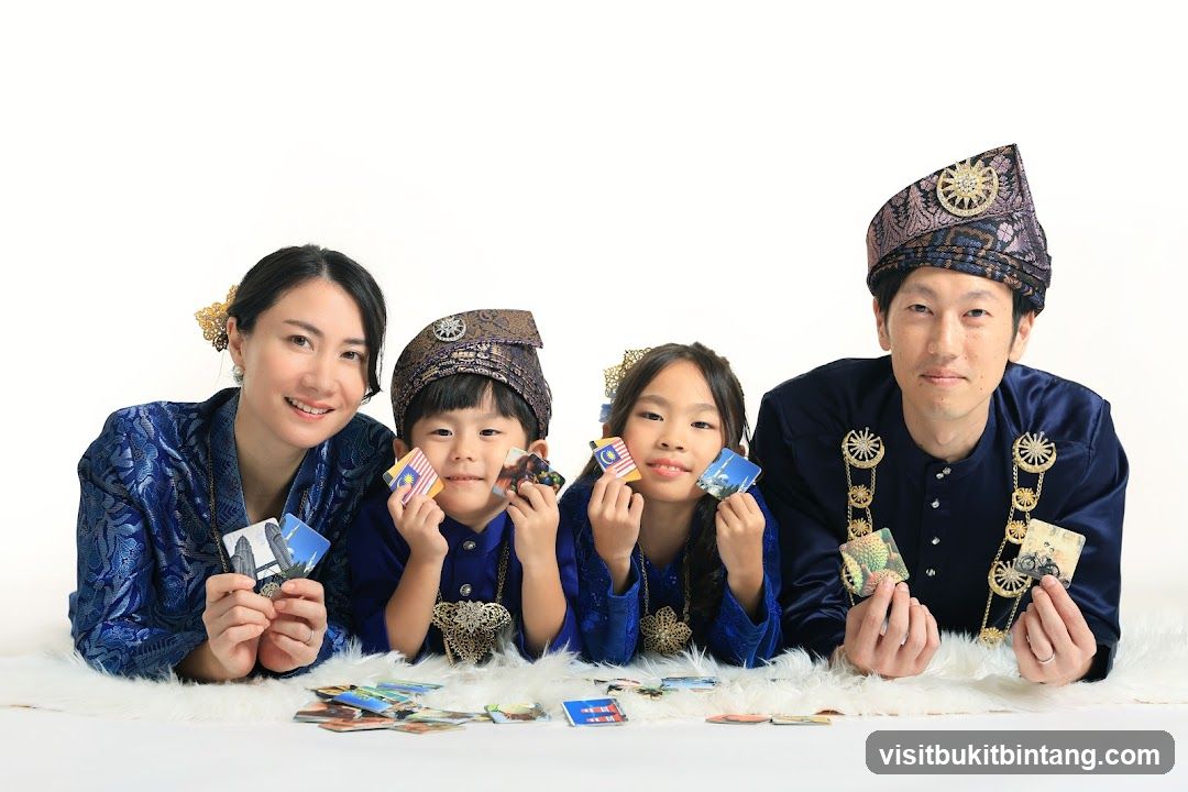 Family in Traditional Attire Holding Cards