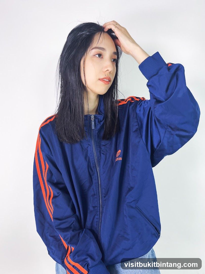 Woman in Adidas Track Jacket