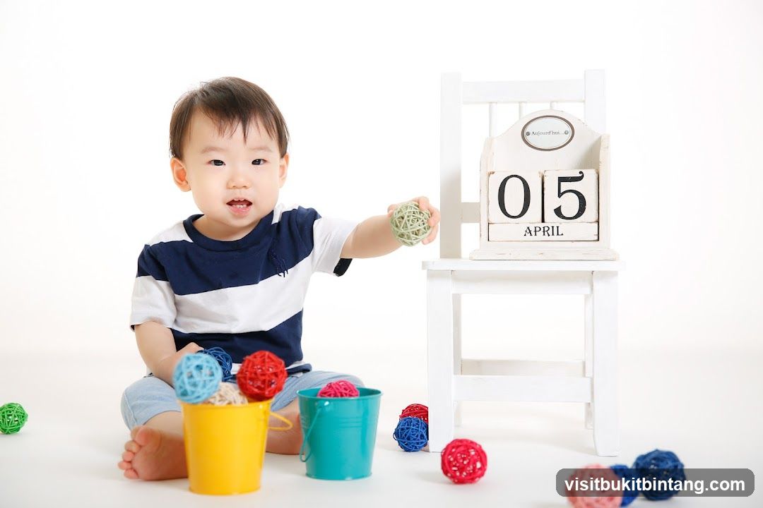 Baby with Decorative Balls