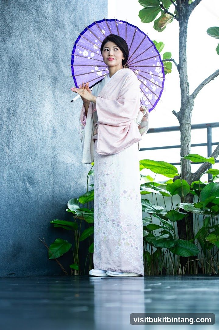 Woman in Kimono Holding Umbrella
