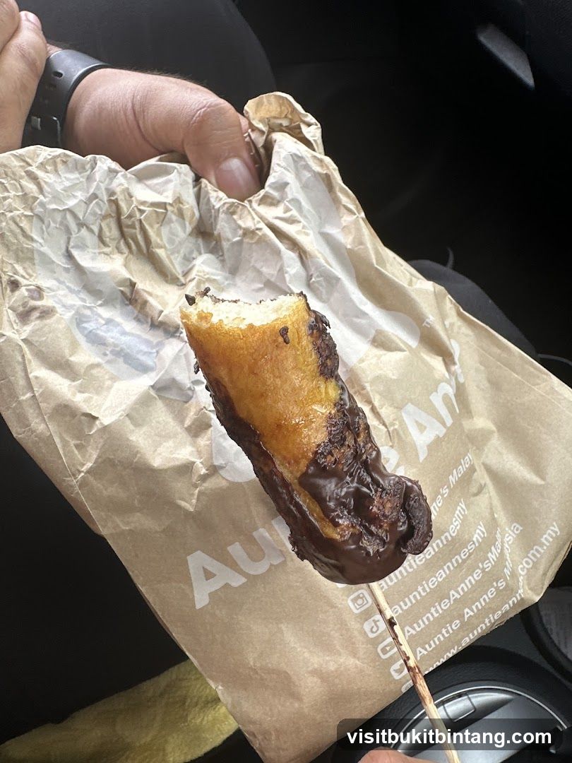 Chocolate-dipped snack on a stick