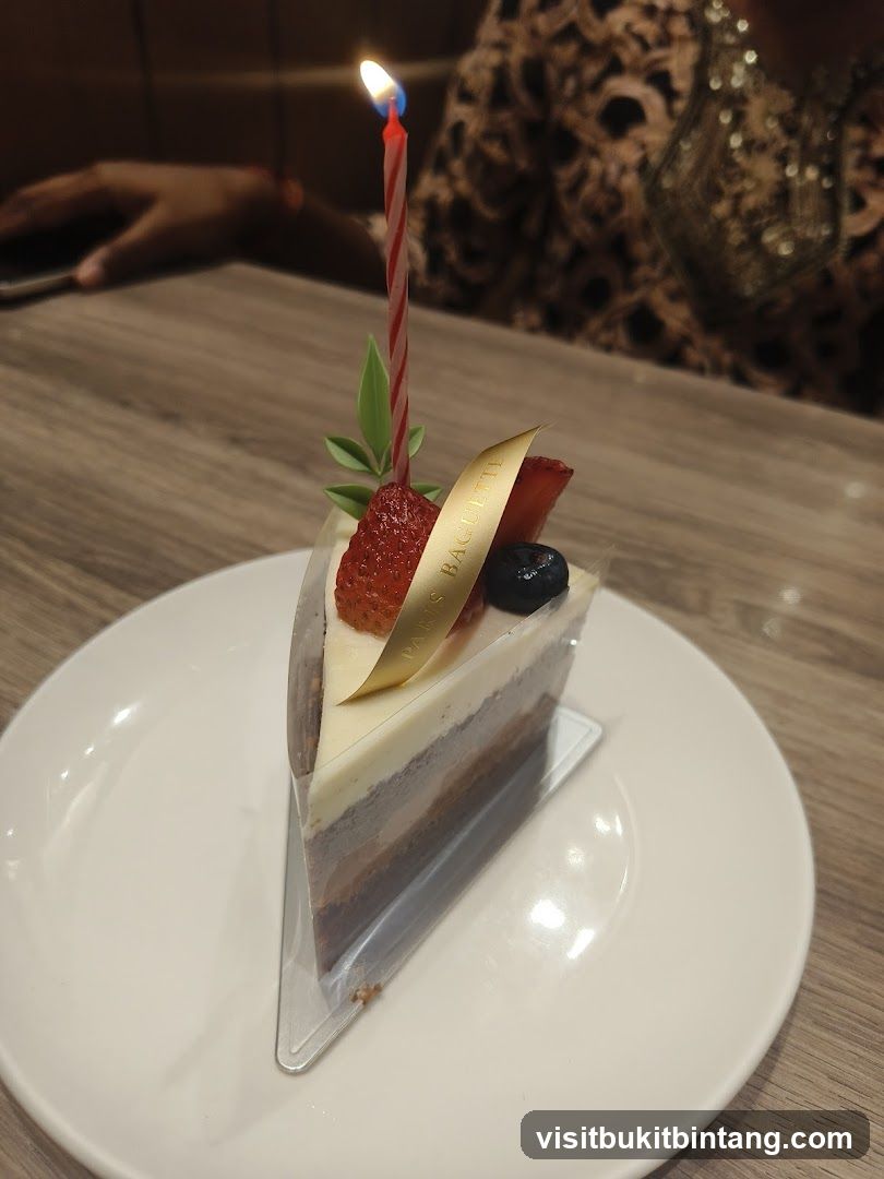 Slice of cake with a candle