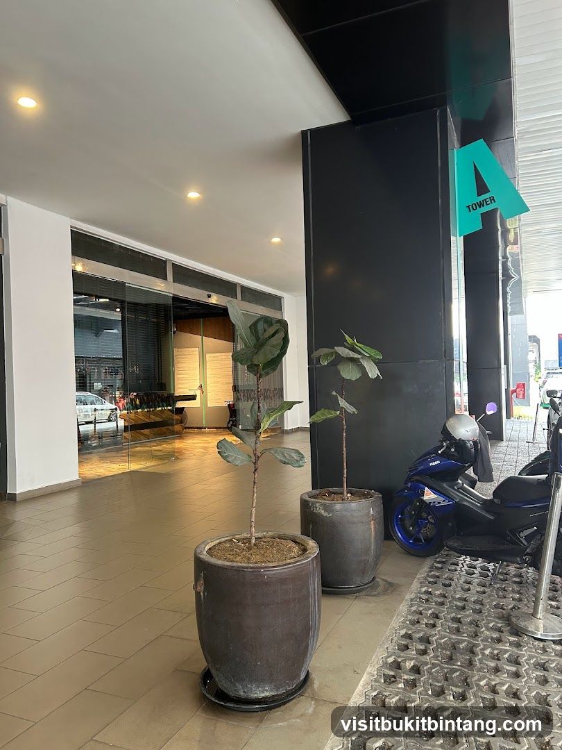 Building Entrance with Plants and Motorcycle