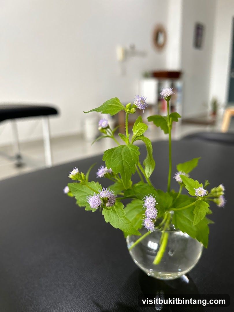 Small Flowers in a Glass Vase