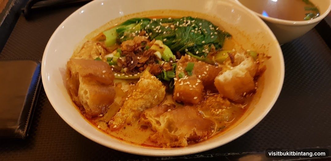 Noodle Soup with Fried Dough and Greens