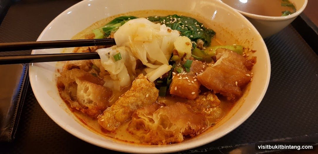 Noodle Soup with Fried Dough and Greens