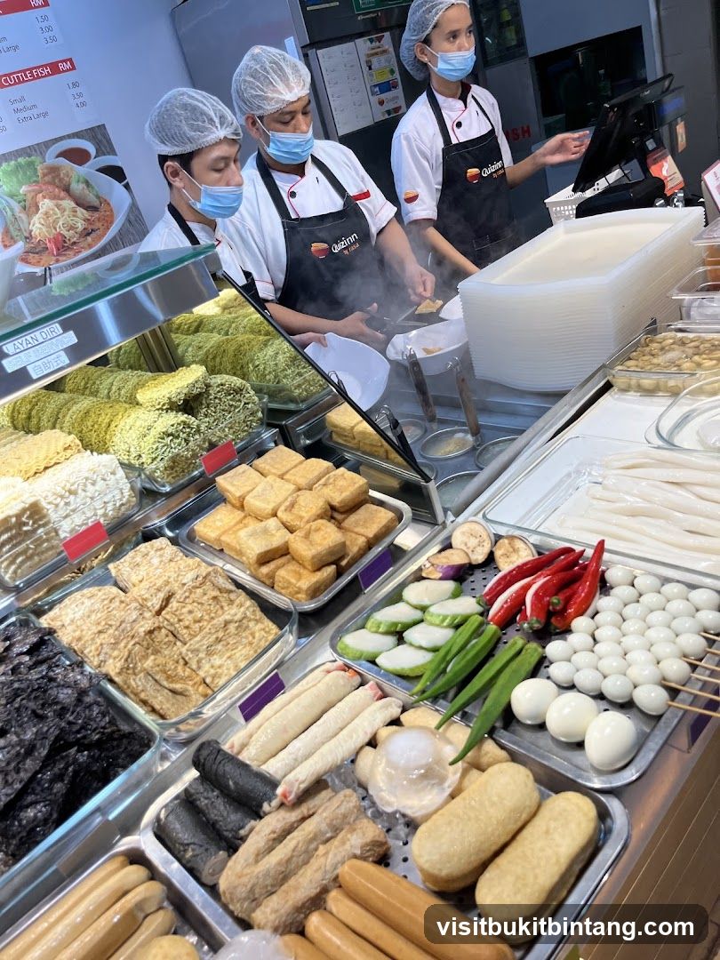 Food Stall Staff Preparing Ingredients