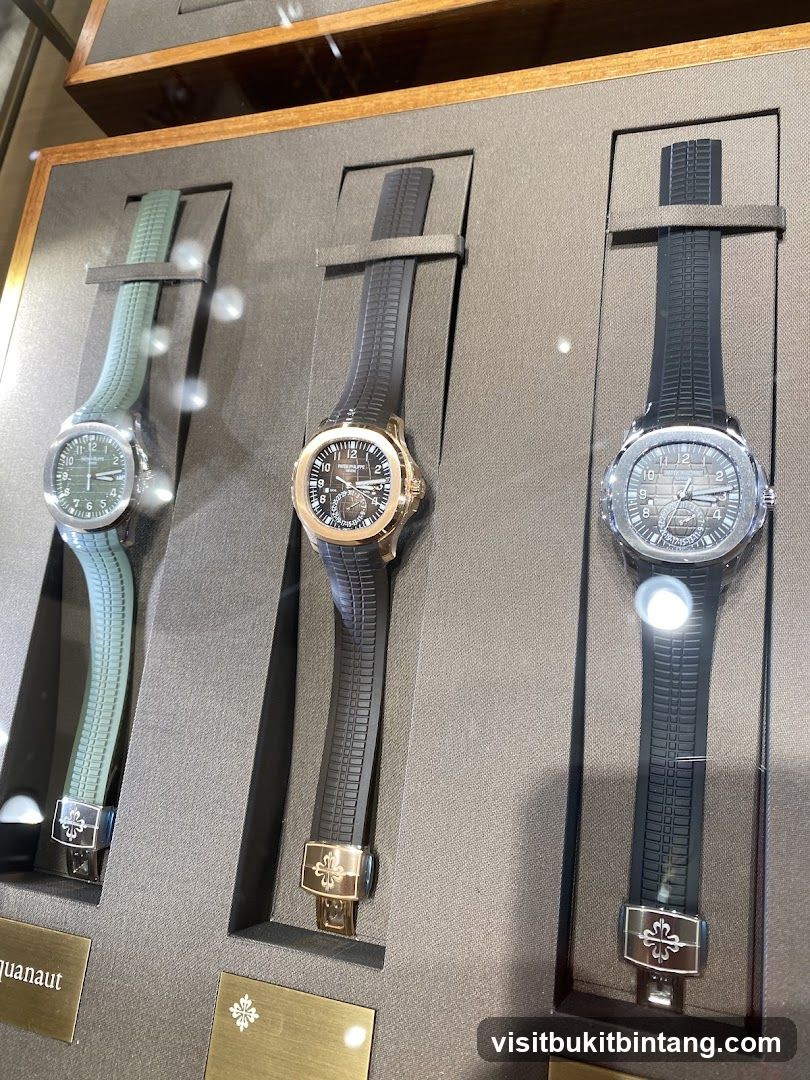 Three luxury watches on display