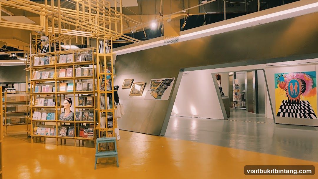 Interior of a bookstore with art displays