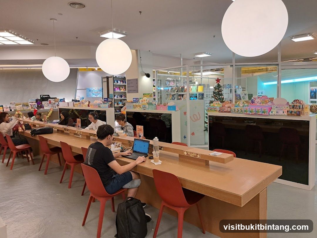 People studying at a long table in a brightly lit store