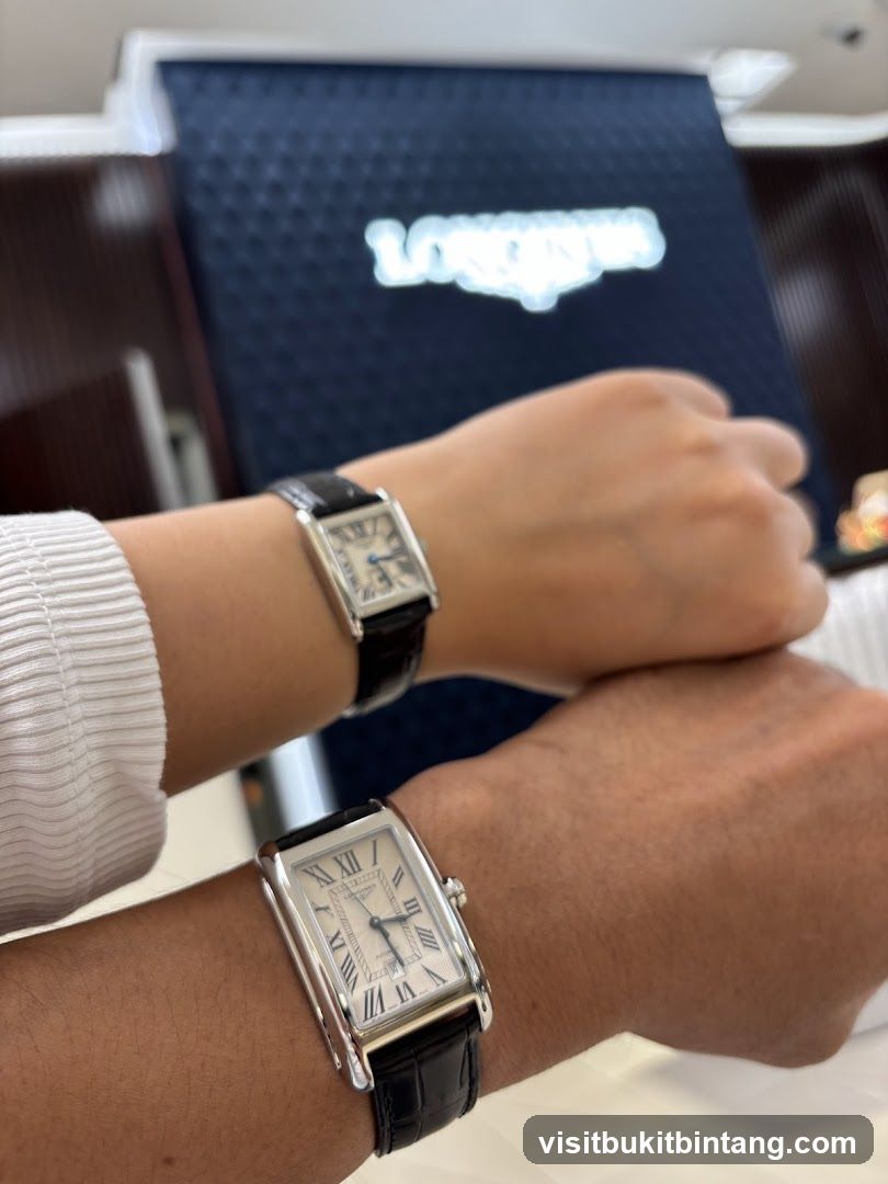 Two watches on wrists