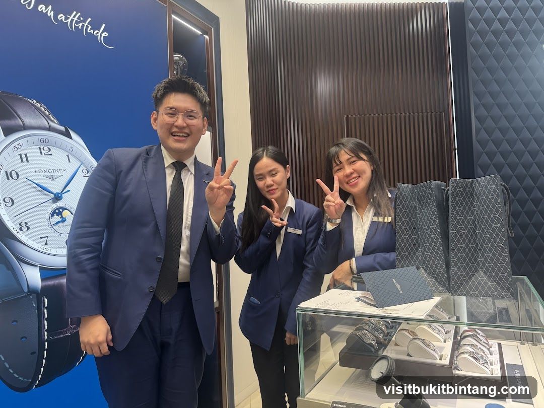 Sales Staff Posing with Watches