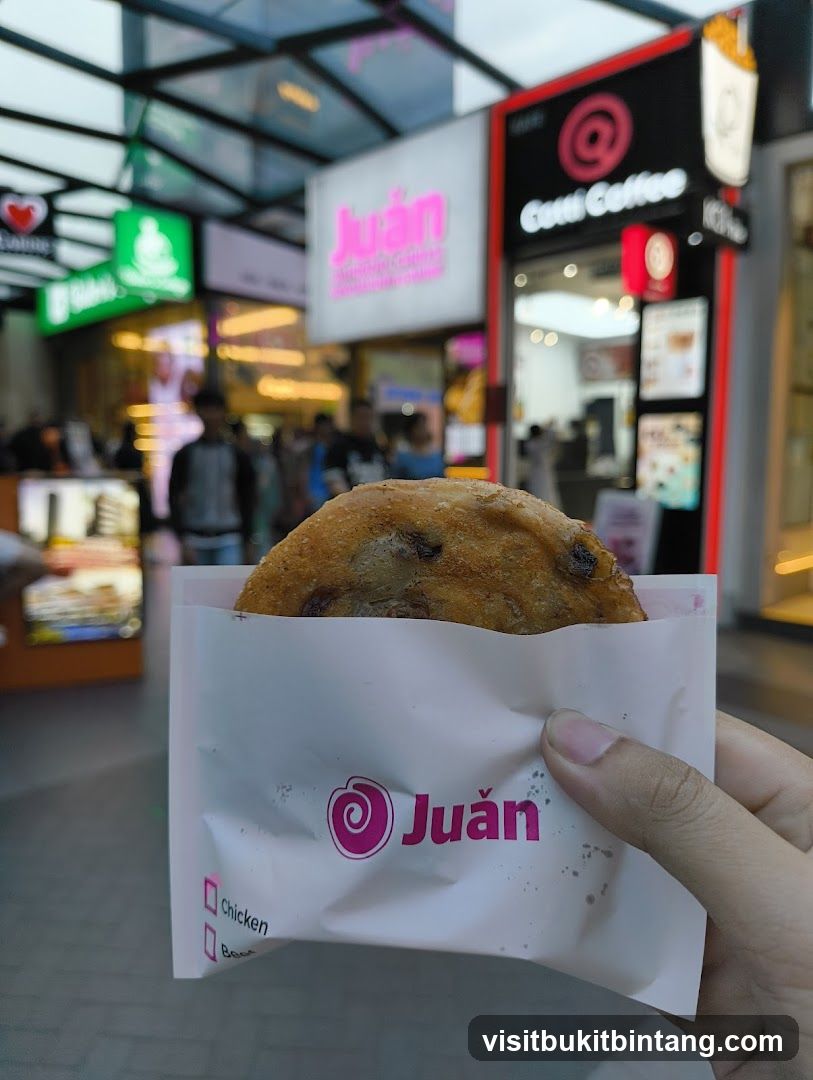 Pastry in a wrapper with shop logo