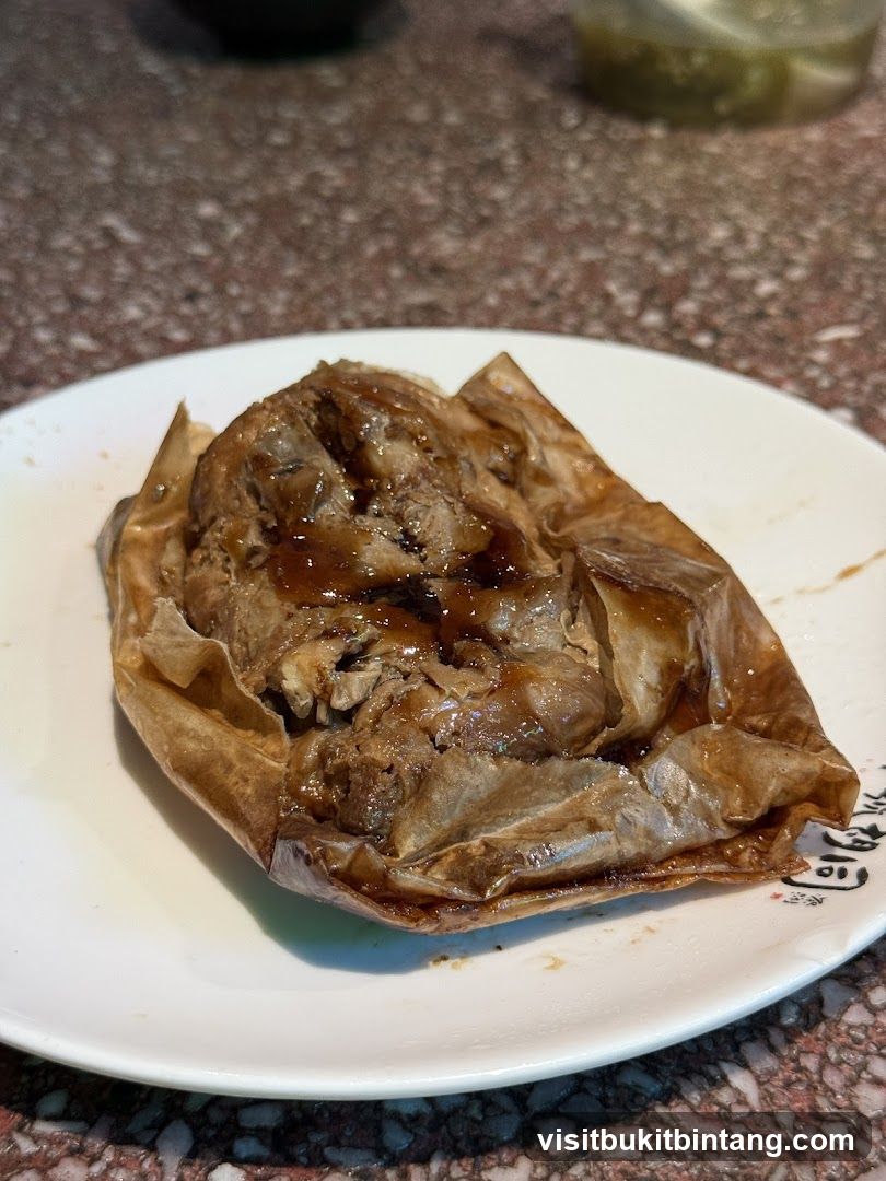 Paper-wrapped meat dish