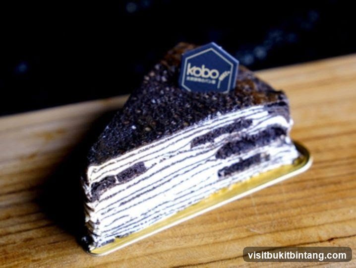 Slice of Black Sesame Mille Crepe Cake