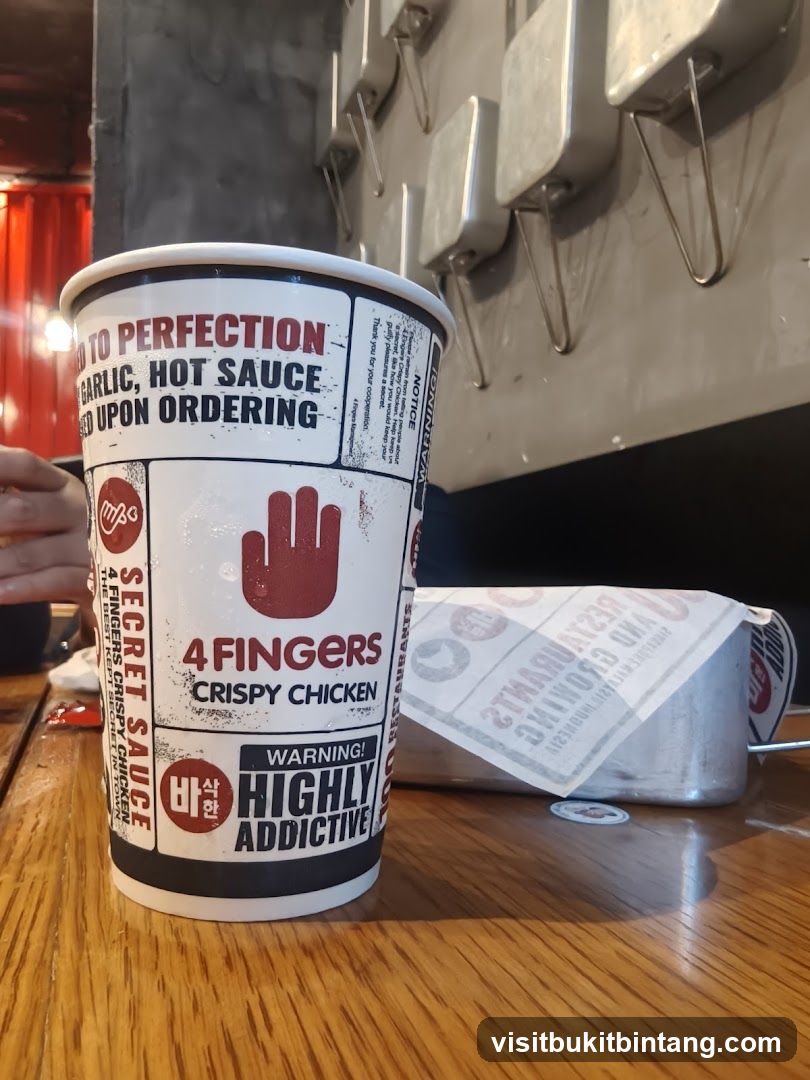 Cup with 4 Fingers Crispy Chicken branding