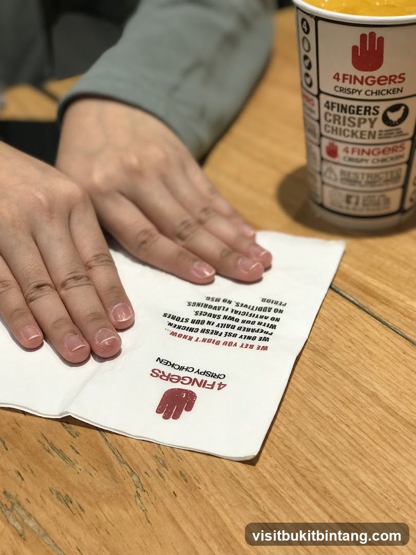 4 Fingers Crispy Chicken Cup and Napkin