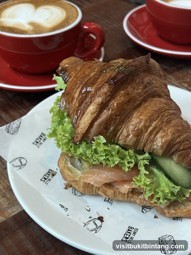 Salmon Croissant Sandwich and Coffee