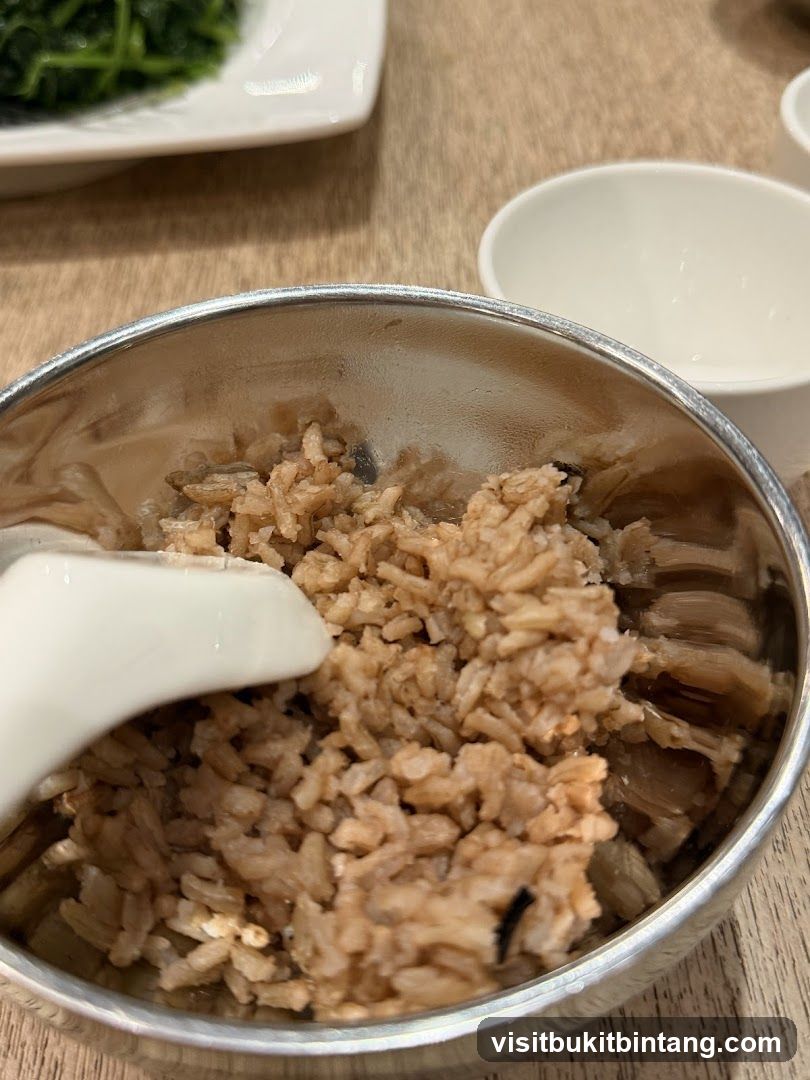 Bowl of rice with spoon
