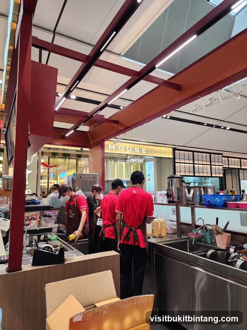 Beverage Shop Staff Preparing Drinks
