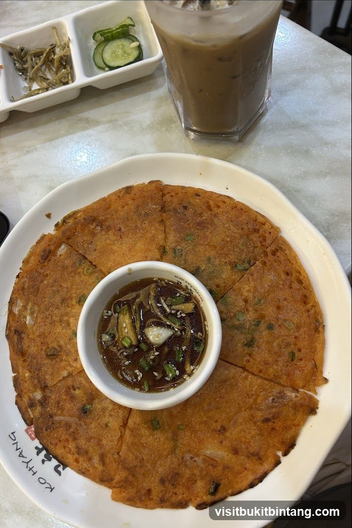 Korean Pancake with Dipping Sauce and Side Dishes