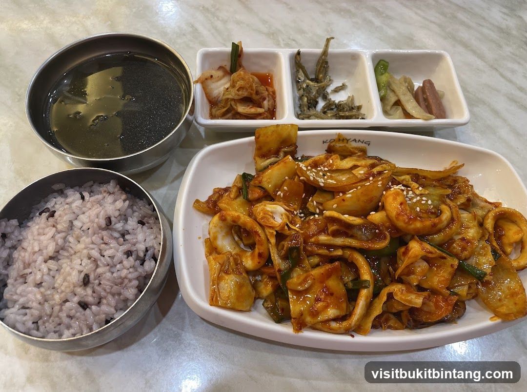 Spicy Stir-Fried Squid with Rice and Side Dishes