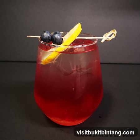 Cocktail with Berries and Lemon