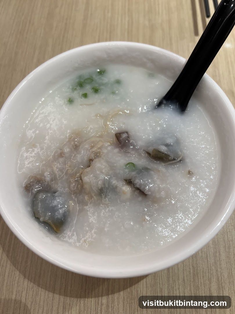 Congee with Preserved Egg and Pork