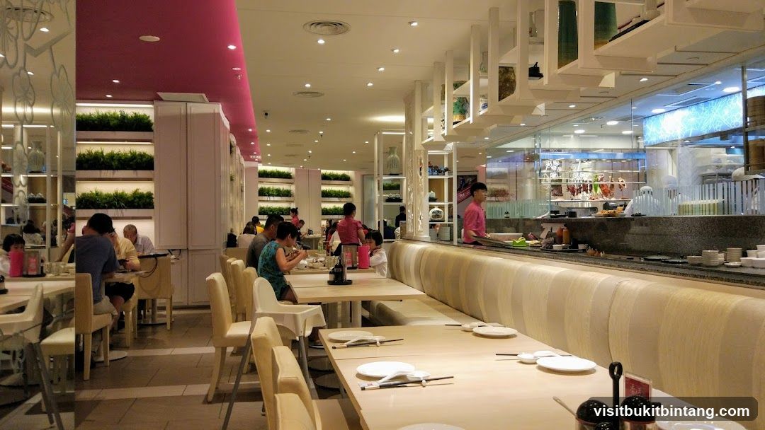 Restaurant Interior with Diners and Open Kitchen