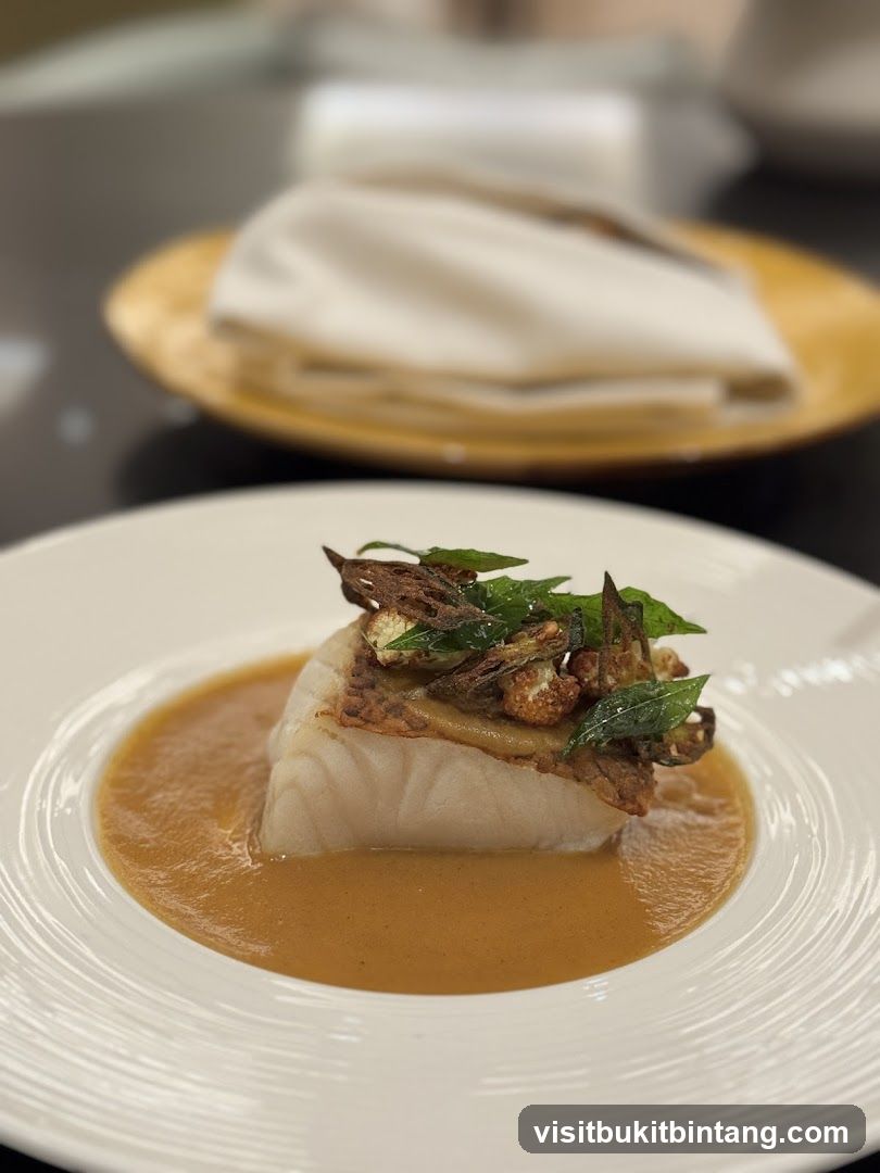 Fish dish with sauce and garnish