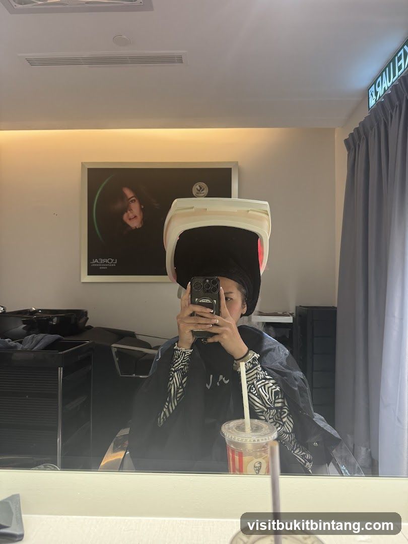 Woman under hair dryer
