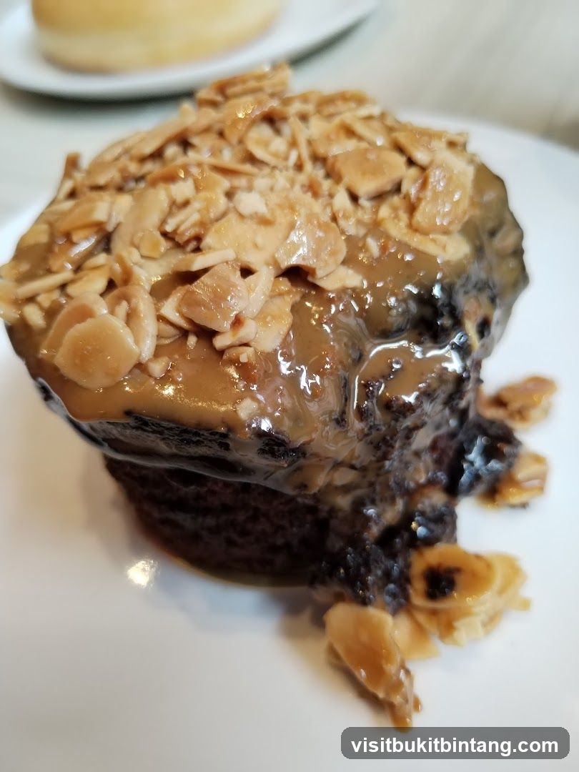 Chocolate cake with caramel and almonds