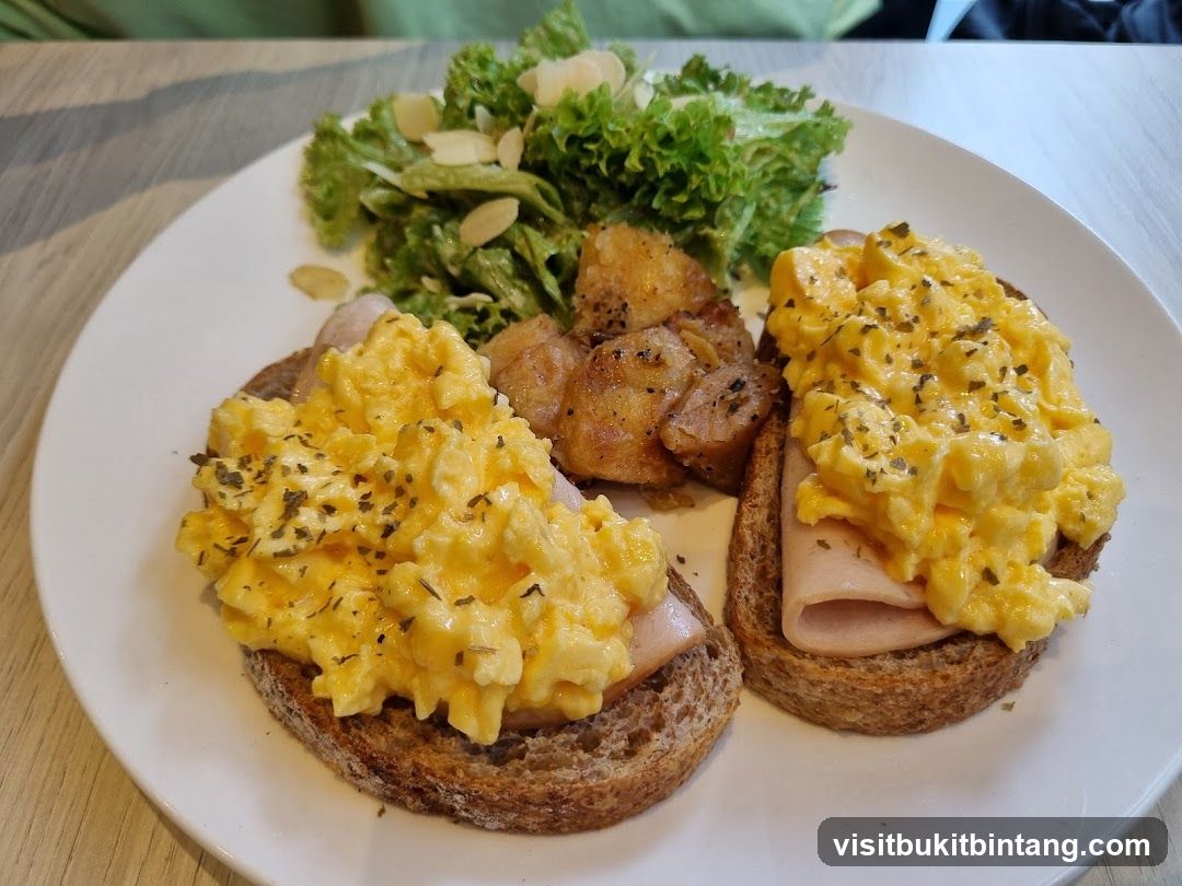 Scrambled Eggs on Toast with Side Salad and Potatoes