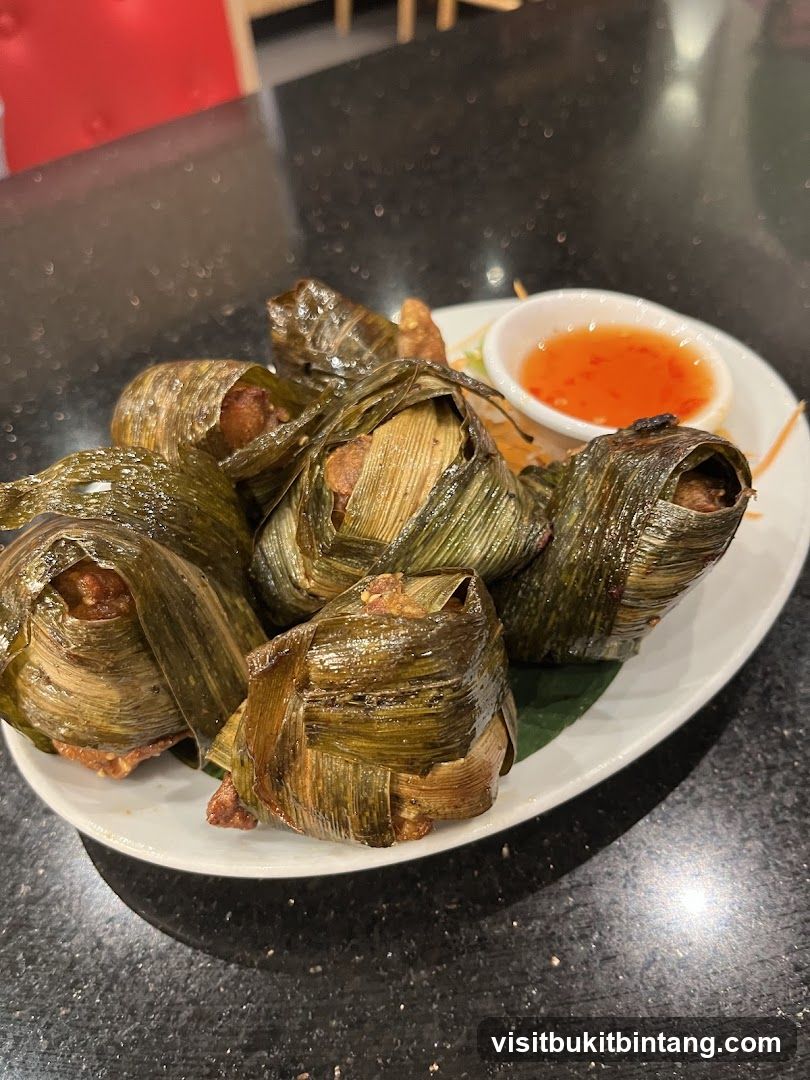 Chicken wrapped in pandan leaves