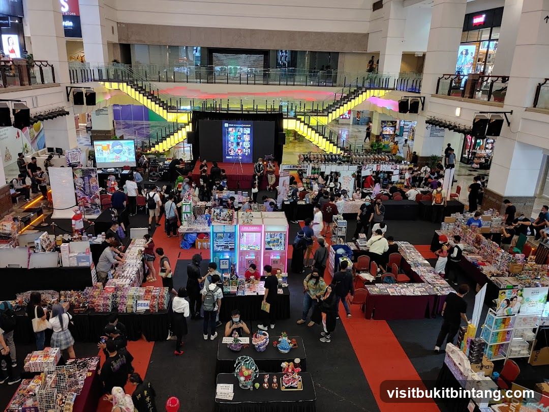 Convention Hall with Booths and Attendees