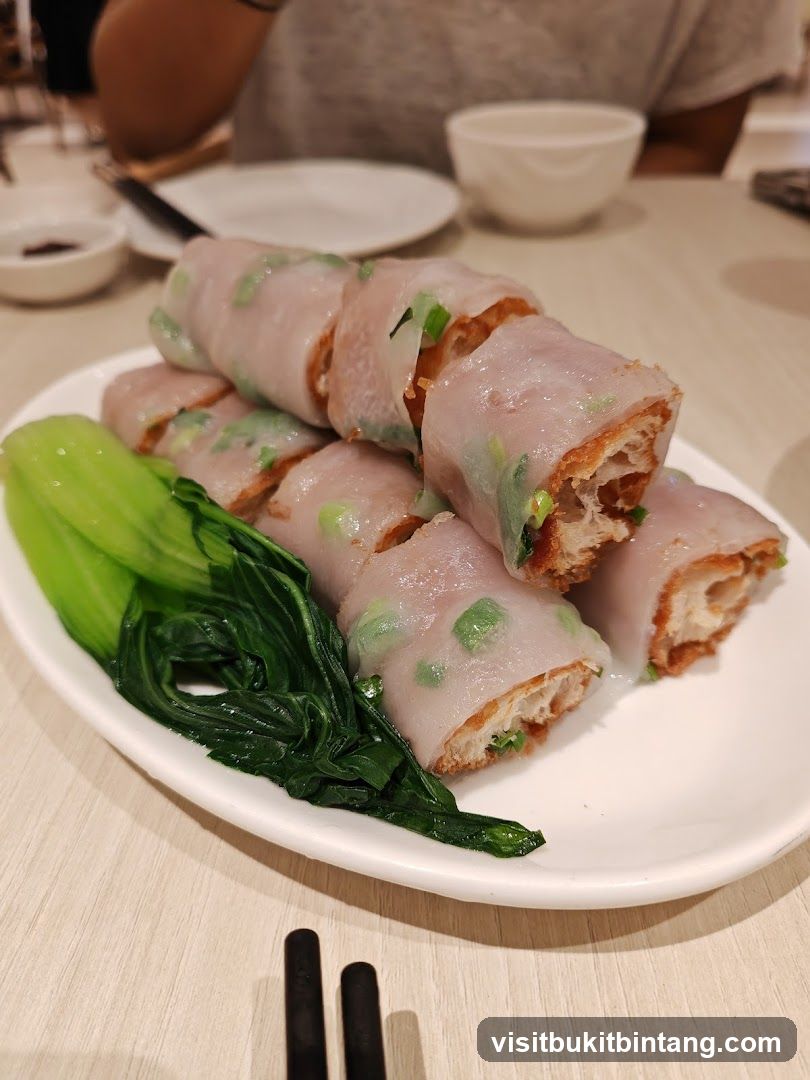 Steamed Rice Rolls with Fried Dough and Greens