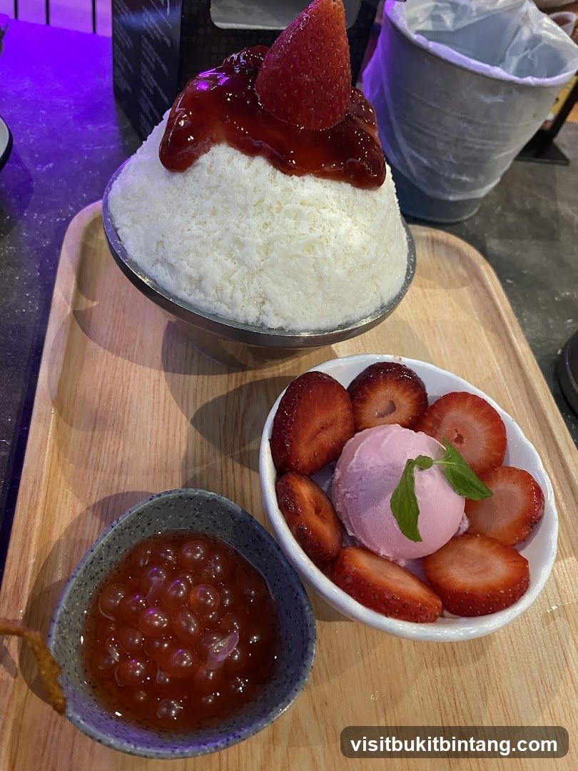 Strawberry shaved ice with ice cream and boba