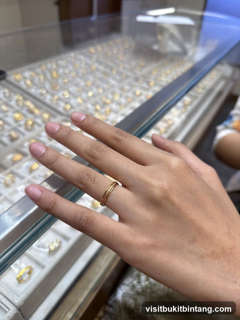 Hand trying on a ring in a jewelry store