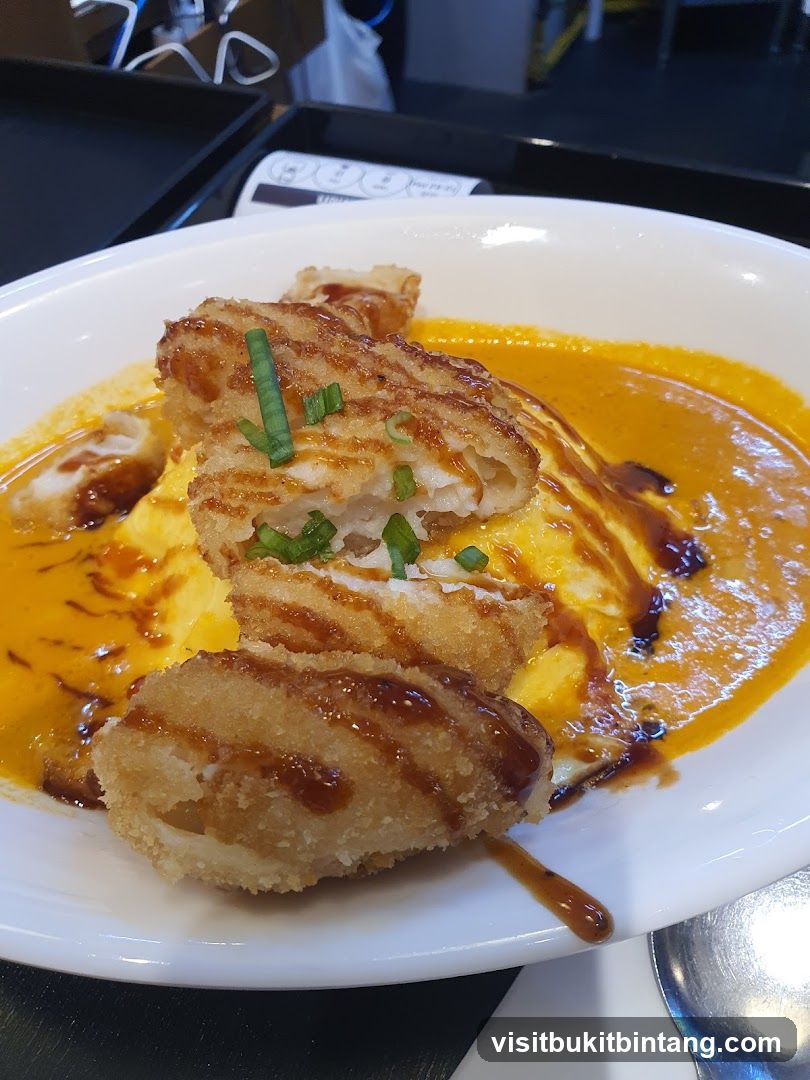 Fried Fish with Omelette and Sauce
